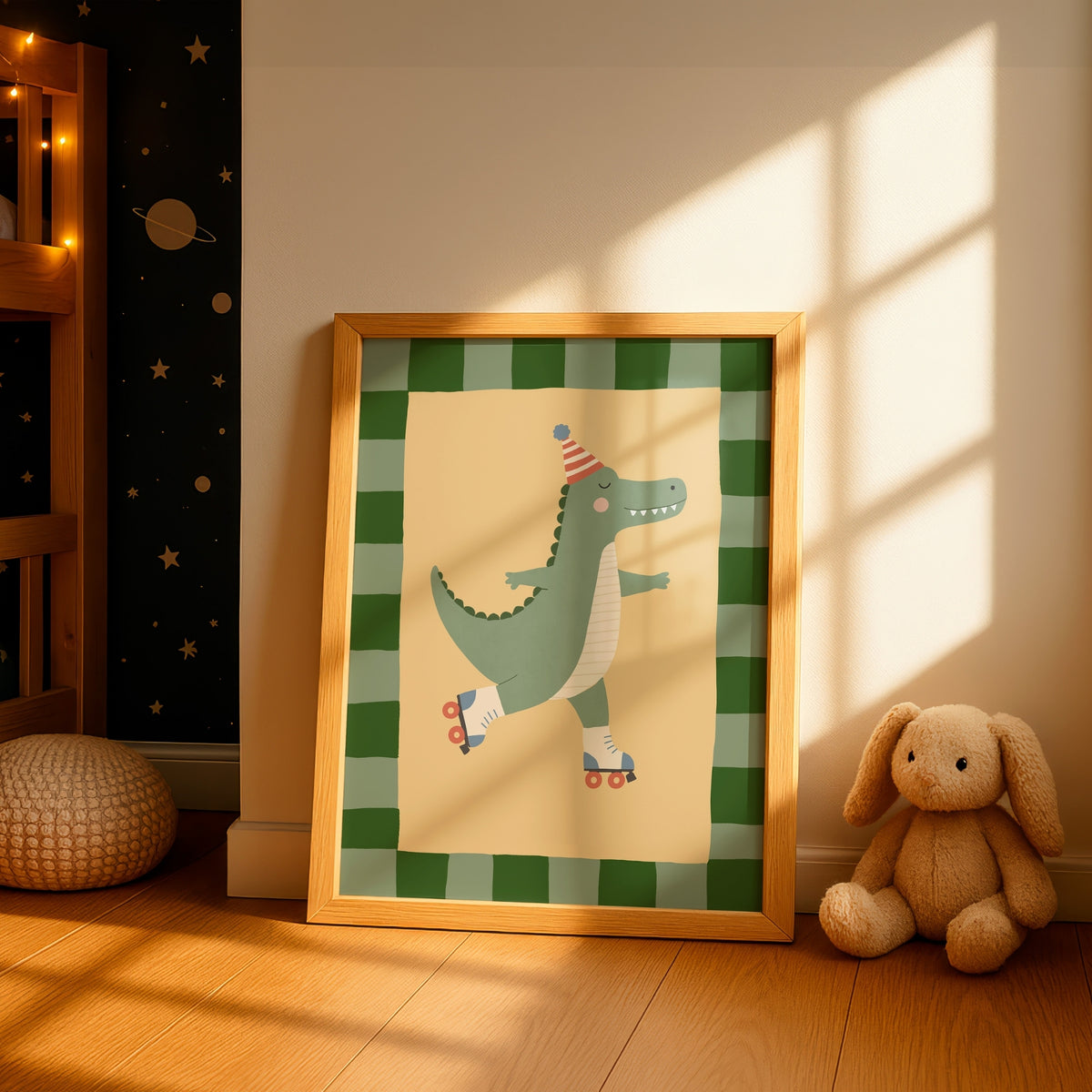 A framed children's art print featuring a green cartoon alligator roller skate, leaning against a wall in a sunlit nursery next to a stuffed bunny.