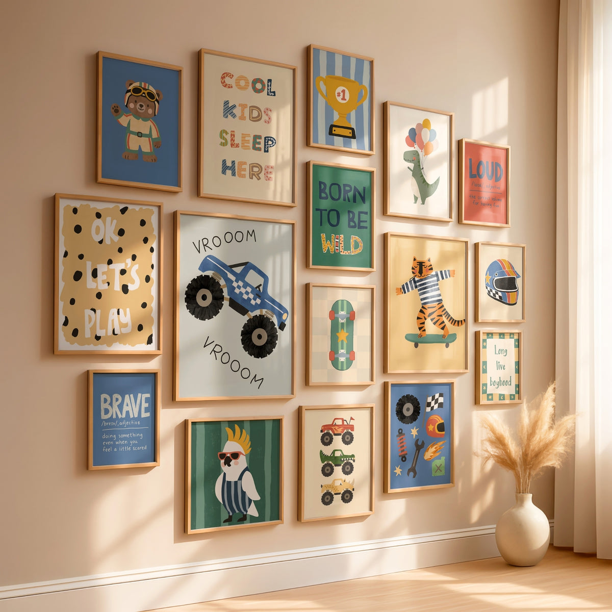 A gallery wall display of multiple framed children's art prints in a warm beige room with sunlight and a vase of dried grass.