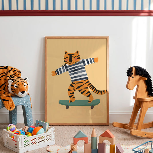 A framed art print featuring a cartoon tiger wearing a striped shirt and balancing on a skateboard, displayed in a child's playroom next to a stuffed tiger and a wooden rocking horse.