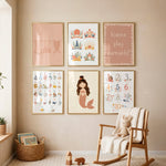 Six-print mermaid gallery wall above a nursery rocking chair, with mermaid alphabet, numbers, crowns and boho ocean art