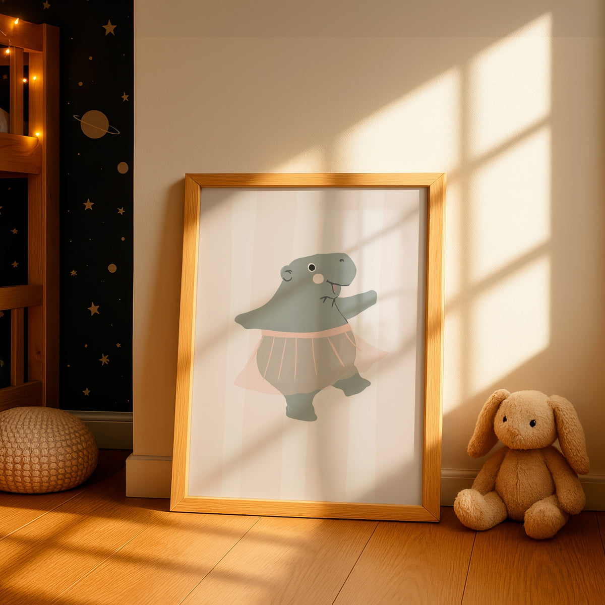 Framed Ballerina Hippo print styled in a nursery – hand-drawn ballerina hippo in a pink tutu on a candy-stripe background