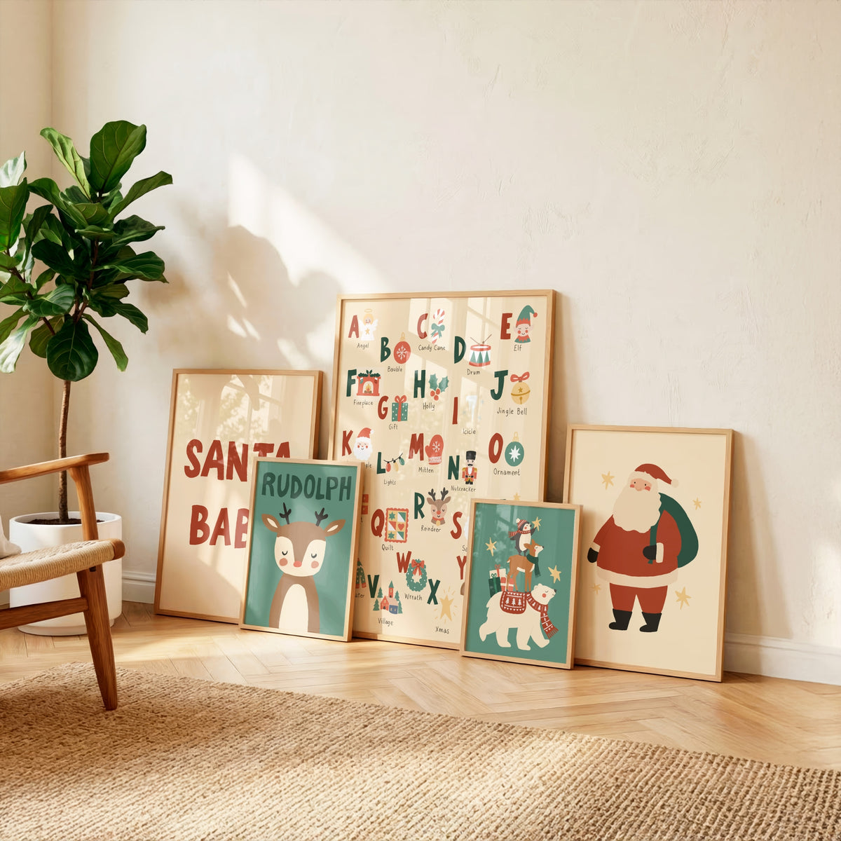 A set of five framed Christmas-themed art prints leaning against a beige wall in a sunlit room. The prints feature festive illustrations including Santa Claus, Rudolph the Red-Nosed Reindeer, a Christmas tree, an alphabet board with holiday icons, and a sign reading 'SANTA BAE'.