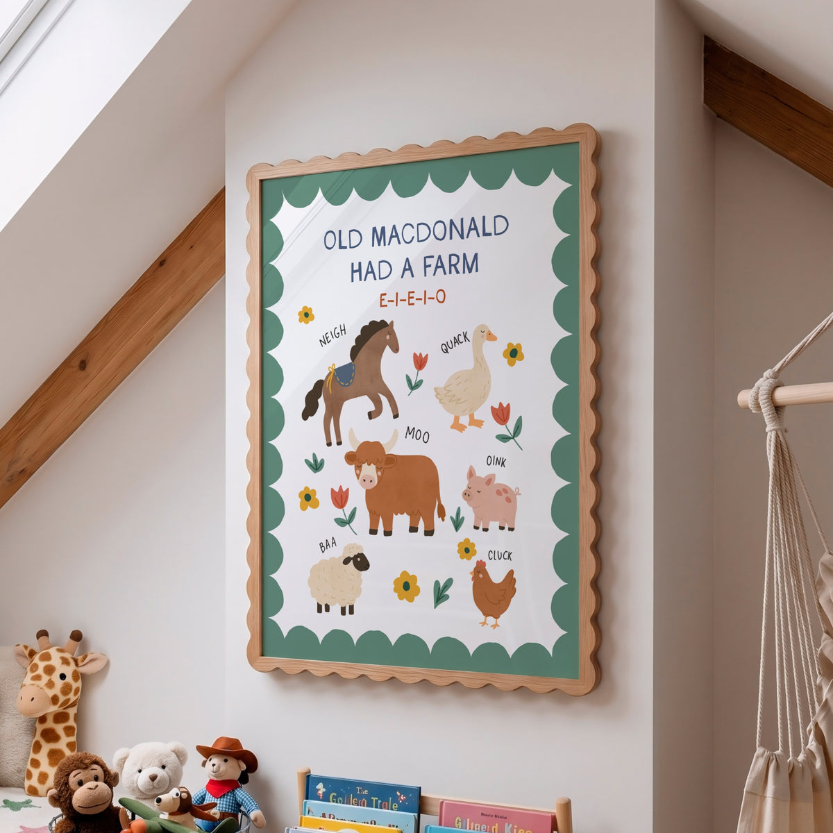 A framed children's alphabet learning poster featuring the phrase 'OLD MACDONALD HAD A FARM' with illustrated farm animals and words, hanging on a wall in a child's room.