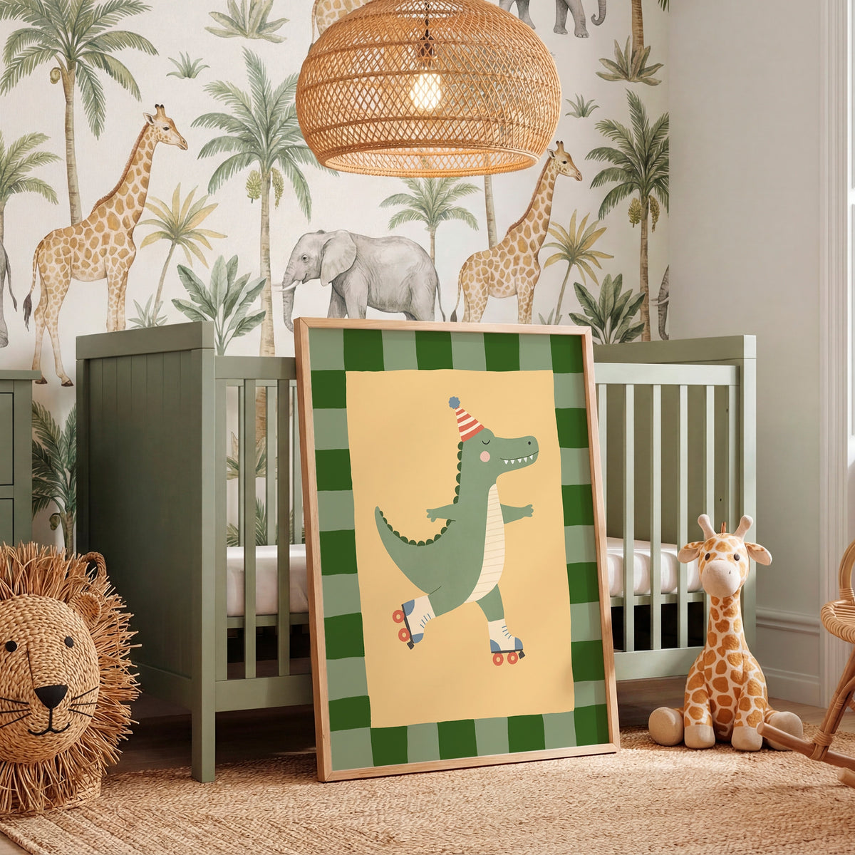 A framed nursery art print featuring a green cartoon crocodile roller skate, leaning against a sage green crib in a styled nursery room with safari wallpaper, a wicker pendant light, and toys.